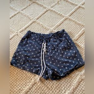 Navy blue linen shorts with white polka dots. A size small from Delias.